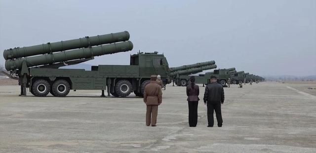 North Korean leader Kim Jong-un far right accompanied by his daughter Ju-ae center watches a drill in Sunan near Pyongyang on March 15 2025 in this photon this photo released by the state-run North Korean Central News Agency the following day