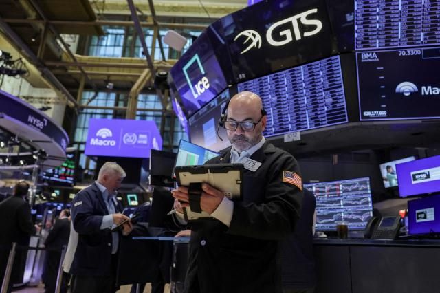 Traders work on the floor at the New York Stock Exchange NYSE in New York City US on March 24 2026 Reuters-Yonhap
