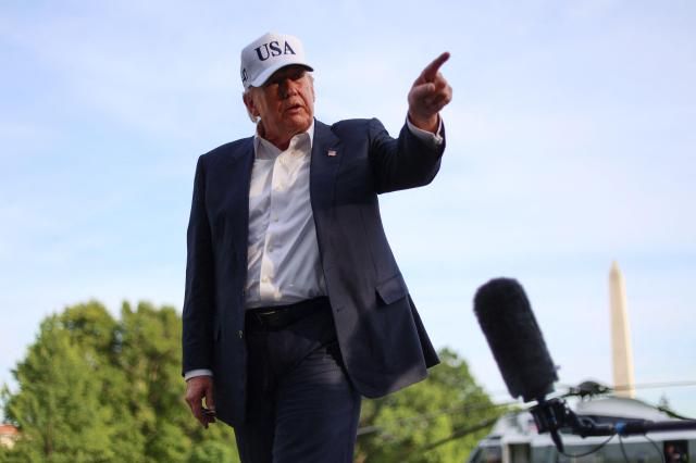US President Donald Trump gestures as he speaks to reporters after arriving on the South Lawn of the White House in Washington DC on May 15 2026 Trump is returning from Beijing where he met with Chinese President Xi Jinping to discuss trade deals in various sectors AFPYonhap