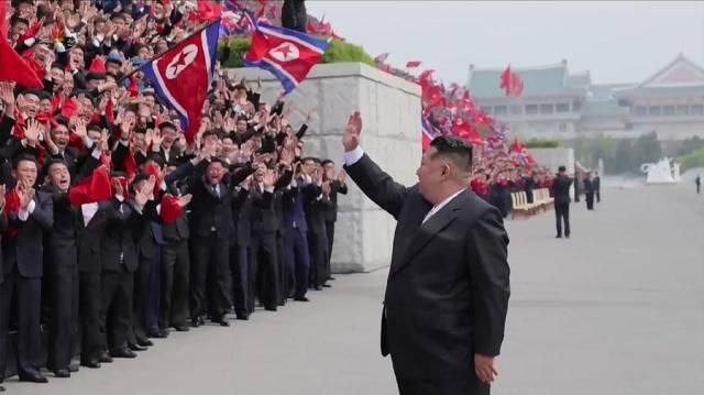 North Korean leader Kim Jong-un waves at a youth rally in Pyongyang on May 2 2026 in this photo released by the state-run North Korean Central News Agency the following day