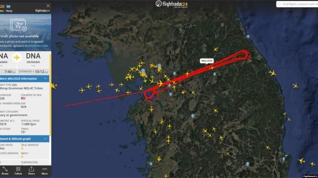 A flight path of a US Navy MQ-4C Triton high-altitude unmanned surveillance aircraft shows repeated passes over central South Korea on July 14 2026 in this screenshot captured from Flightradar24 on July 22