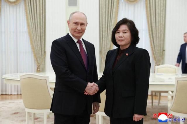 Russian President Vladimir Putin left shakes hands with North Korean Foreign Minister Choe Son-hui during a meeting at the Kremlin in Moscow on July 19 2026 in this photo from North Koreas state-run Korean Central News Agency KCNA 
