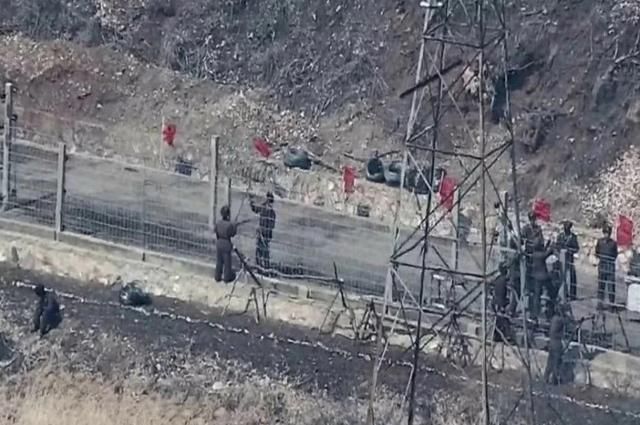 North Korean soldiers carry out fence construction near the Military Demarcation Line inside the Demilitarized Zone in 2024 Courtesy of South Korea’s Joint Chiefs of Staff