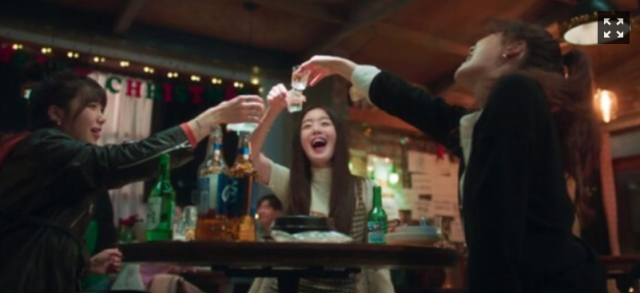 This photo captured from a popular Korean drama series Work Later Drink Now from OTT TVing show protagonist drinking Korean Soju with others 