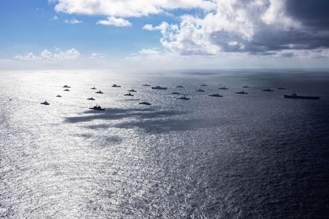 Combined naval forces participating in the 2026 Rim of the Pacific Exercise RIMPAC conduct maritime training in waters north of the Hawaiian Islands on July 22 2026 Courtesy of the US Navy
