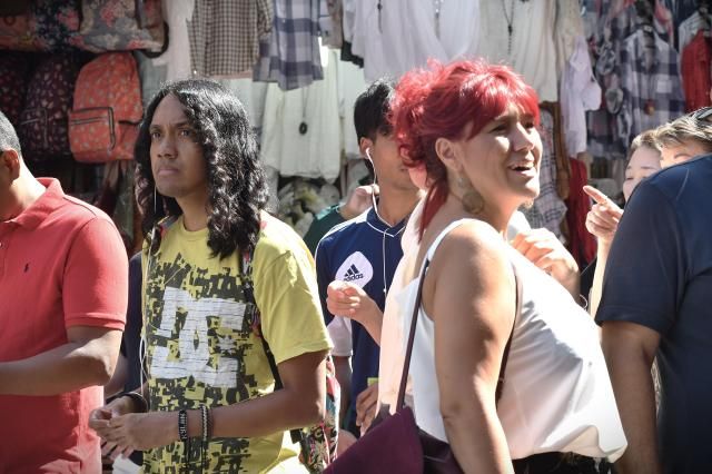 Foreign tourists browse clothing stalls at Namdaemun Market in central Seoul Sept 22 2026 AJP Joonha Yoo
