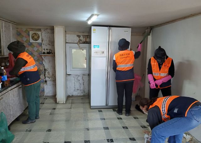 장항읍의용소방대가 펼친 주거환경개선 봉사활동