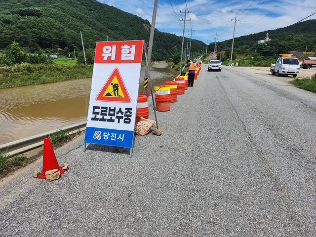 사본 -(사진1)도로 수해 복구 현장1