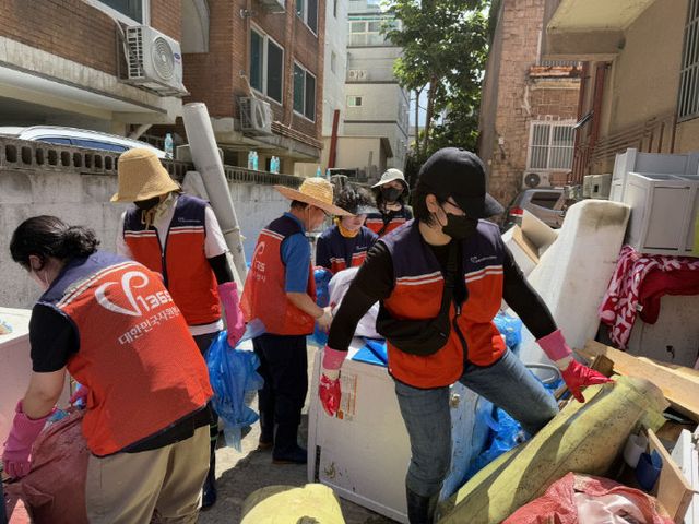 수해복구 봉사활동 전개 (1)