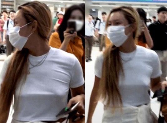 사진=가수 화사가 인천공항을 통해 귀국하며 논란이 불거진 '노브라 패션'의 모습/온라인 커뮤니티