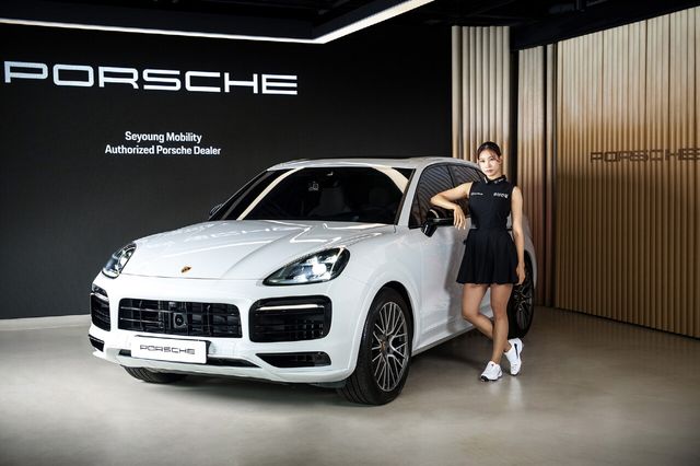 ▲유현주 프로와 포르쉐(사진=세영모빌리티)