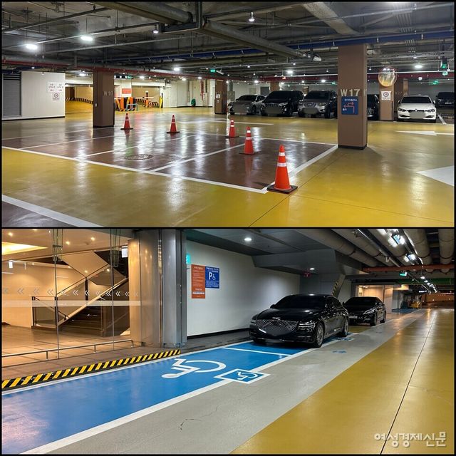 한화생명 본사 지하에 위치한 주차구역. 넓은 일반 주차구역(위쪽)은 러버콘으로 세워 지정 주차구역으로 보이게 했다. 그런데 장애인 전용 주차구역(아래쪽)의 경우 휠체어를 내릴 수 있는 공간이 일반 차량이 지나가는 길목에 있을뿐더러 빗금 구역조차 없다. /여성경제신문