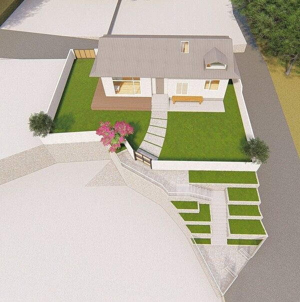 대지 전면에 경사진 부분을 계단식 정원을 만들어 집 안으로 들어오는 과정적 공간의 깊이감이&nbsp;지산심한의&nbsp;백미가 되게 했다. /김정관