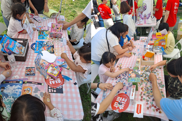 ’책 읽는 한강공원’ 학산문화사 부스에서 다양한 놀이 체험을 하는 시민들 (사진제공=학산문화사)