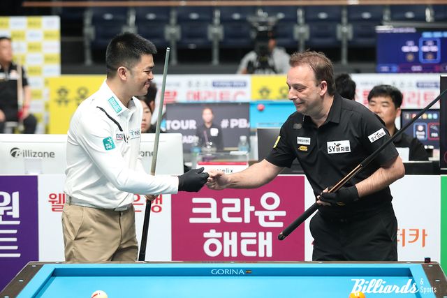 64강전 시작 전 인사를 나누는 응우옌꾸옥응우옌과 다니엘 산체스. 사진=고양/김민영 기자