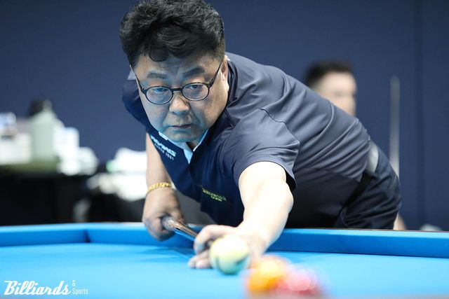 김현석에게 대역전승을 거둔 PBA 최고령 선수 김무순.