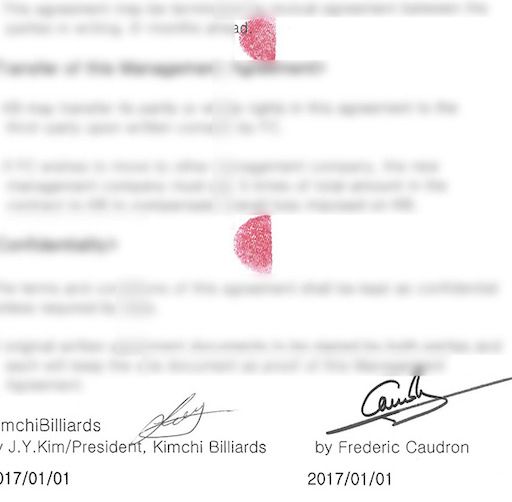 김치빌리아드 측이 증거로 제시한 2017년도 1월 1일 계약서에 찍힌 양측의 지장 간인과 사인. 사진=김치빌리아드 제공