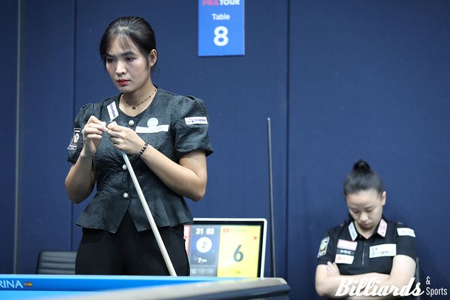 응우옌호앙옌니와 64강에서 대결 중인 스롱 피아비.