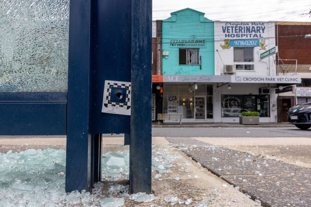 An evidence marker is placed on a waiting station at the site of a shooting incident, where multiple people were wounded on Sunday, in Croydon Park in Sydney, Australia, October 6, 2025. AAP/Sitthixay Ditthavong via REUTERS ATTENTION EDITORS - THIS IMAGE WAS PROVIDED BY A THIRD PARTY. NO RESALES. NO ARCHIVE. AUSTRALIA OUT. NEW ZEALAND OUT. NO COMMERCIAL OR EDITORIAL SALES IN NEW ZEALAND. NO COMMERCIAL OR EDITORIAL SALES IN AUSTRALIA.