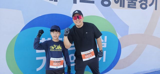 이번 대회에서 사람들에게 가장 많은 응원을 받은 조정현, 조지훈 부자. 안형철기자