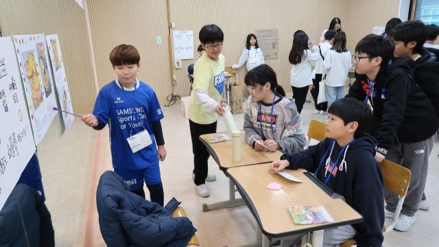 20일 탄소중립 교육과정 발표회에서 한 구운초 학생이 지구살림 지구농업을 소개하고 있다. 구운초 제공