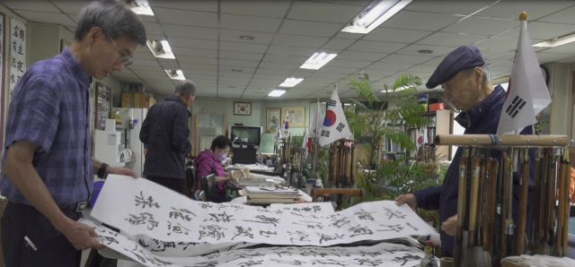 지역미디어 공모사업 선정팀 ‘디지털나누미’가 제작한 작품 ‘보훈서우회’ 스틸컷. 수원문화재단 제공