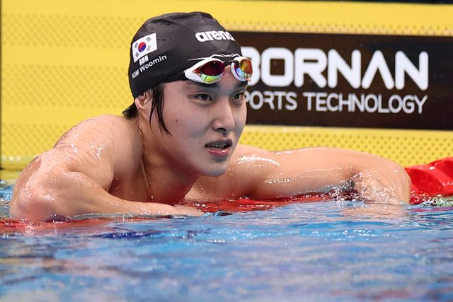 지난 22일 도쿄 아쿠아틱스 센터에서 열린 2026 아이치·나고야 아시안게임 수영 남자 1500m 자유형 결승에서 부상 여파로 최하위에 머무른 김우민이 허탈한 표정을 짓고 있다. 연합뉴스
