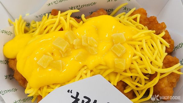 치킨매니아 망고치킨. 기사 이해를 돕기 위해 AI로 만든 이미지입니다. / 위키푸디