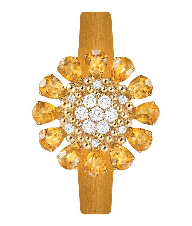 시트린이 세팅된 플레르 드 하와이 시크릿 워치. 