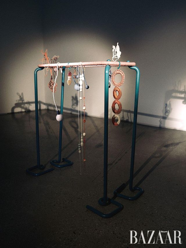 〈Composition Game〉, 2025, Stainless steel (pipes, and a small flat sculpture), textile strings, beads, bells, and stainless steel wire, 116x113x50cm. Courtesy of the artist and PKM Gallery.