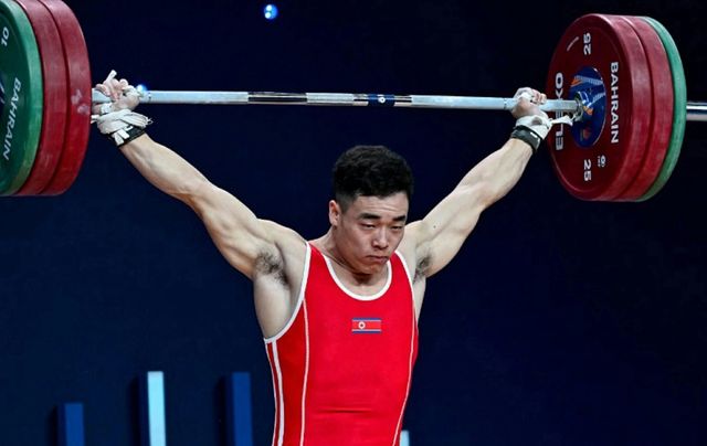 (평양 노동신문=뉴스1) = 북한 노동당 기관지 노동신문은 11일 2024년 국제역기연맹 세계선수권대회에 참가한 김일경 선수가 끌어올리기(인상), 추켜올리기(용상), 종합에서 각각 1위를 차지해 3개의 금메달을 획득했다고 보도했다. 리룡현 선수는 추켜올리기(용상), 종합에서 각각 1위를 했다고 전했다. [국내에서만 사용가능. 재배포 금지. DB 금지. For Use Only in the Republic of Korea. Redistribution Prohibited] rodongphoto@news1.kr