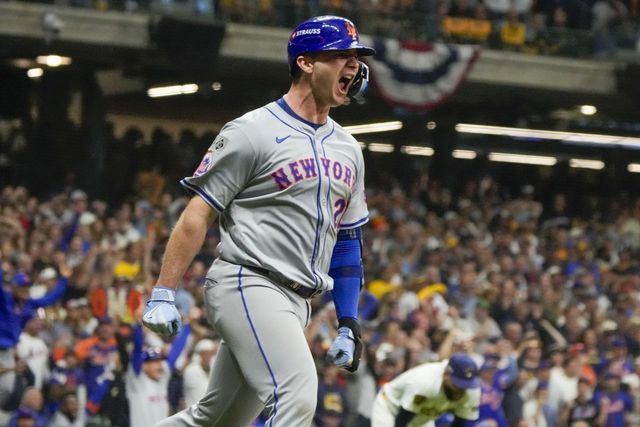 FILE - New York Mets‘ Pete Alonso reacts after hitting a three-run home run during the ninth inning of Game 3 of a National League wild card baseball game against the Milwaukee Brewers Thursday, Oct. 3, 2024, in Milwaukee. (AP Photo/Morry Gash, File)