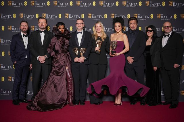 Andy Jurgensen, from left, Leonardo DiCaprio, Teyana Taylor, Paul Thomas Anderson, Sara Murphy, Chase Infiniti, Benicio Del Toro, Cassandra Kulukundis, and Michael Bauman pose with the awards for best director, cinematography, and adapted screenplay for ‘One Battle After Another’ at the 79th British Academy Film Awards, BAFTA‘s, in London, Sunday, Feb. 22, 2026. (AP Photo/Alastair Grant)