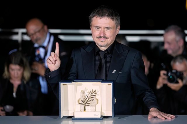 Cristian Mungiu, winner of the Palme d‘Or for ’Fjord,‘ poses for photographers at the awards ceremony photo call during the 79th international film festival, Cannes, southern France, Saturday, May 23, 2026. (AP Photo/John Locher)
