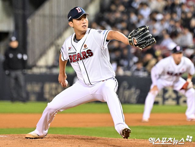 두산 투수 홍건희는 2025시즌 종료 뒤 옵트아웃 권한을 발동할 권리를 보유했다. 엑스포츠뉴스 DB
