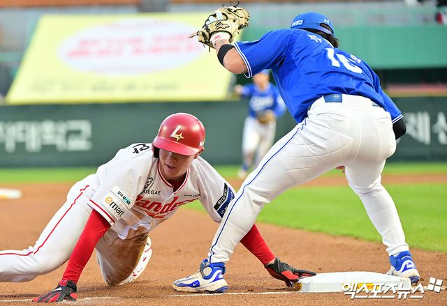 29일 오후 인천SSG랜더스필드에서 열린 '2025 신한 SOL Bank KBO리그' 삼성 라이온즈와 SSG 랜더스의 경기, 2회말 2사 2루 SSG 박성한이 3루 도루를 시도하다 삼성 류지혁에게 태그 아웃을 당하고 있다. 엑스포츠뉴스 DB