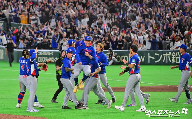 8일 오후 일본 도쿄돔에서 열린 2026 월드베이스볼클래식(WBC) C조 한국과 대만의 경기, 한국이 승부치기까지 가는 끝에 대만에 4:5 역전패를 당했다. 대만 선수들이 기뻐하고 있다. 도쿄, 김한준 기자