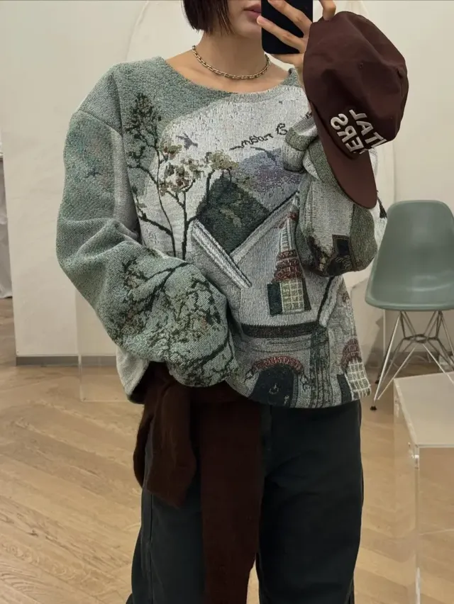 초록색 아트니트와 차콜 와이드 팬츠로 편안하면서도 세련된 겨울 패션을 완성한 금새록의 모습이다. /사진=금새록 인스타그램