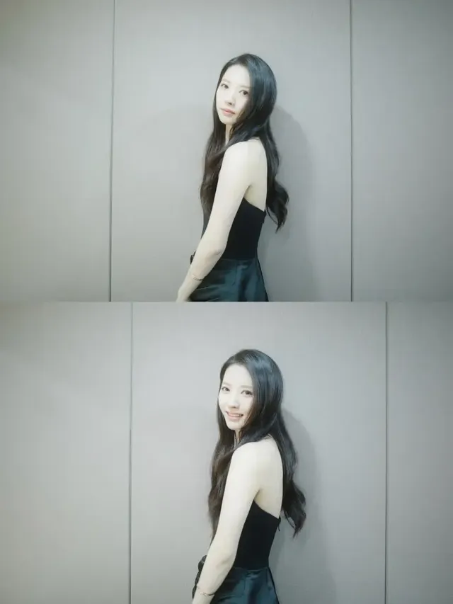 벽에 기대어 우아한 실루엣과 완벽한 직각 어깨 라인을 드러낸 김지연. /사진=김지연 인스타그램