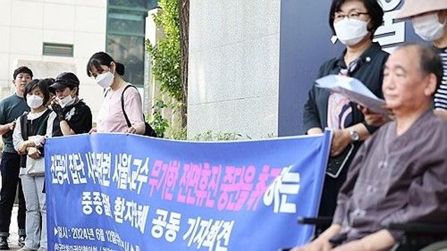 휠체어탄 루게릭 환자 
