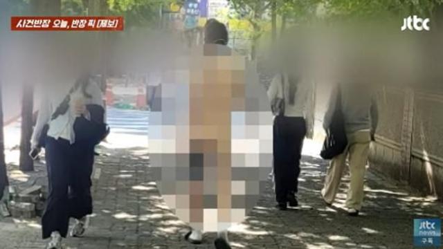 '알몸' 외국인, 대낮 여의도 활보...모자·신발만 착용하고 '노래' 불러