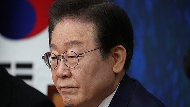 李 