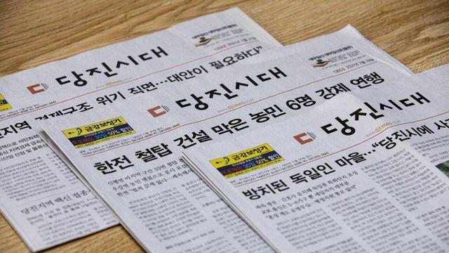 배달부가 신문을 강제 투입하는 이유