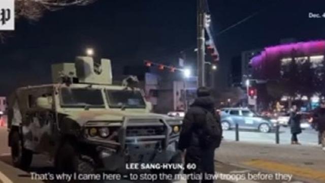 이재명 “이분 꼭 찾아달라”…맨몸으로 군용차 막은 시민