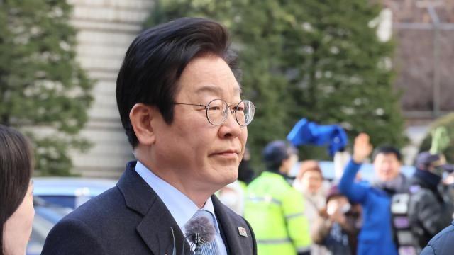 李 