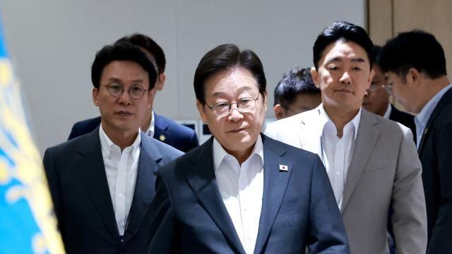 李 