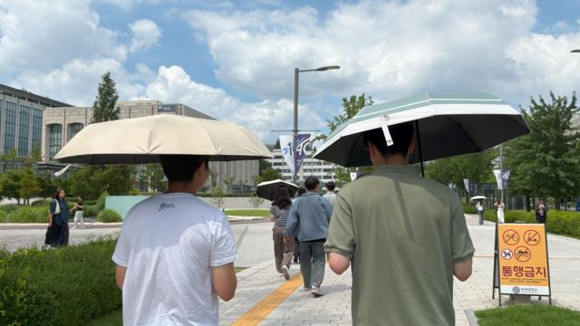 韩国极端天气频现 高温与暴雨应对机制再度叠加运行