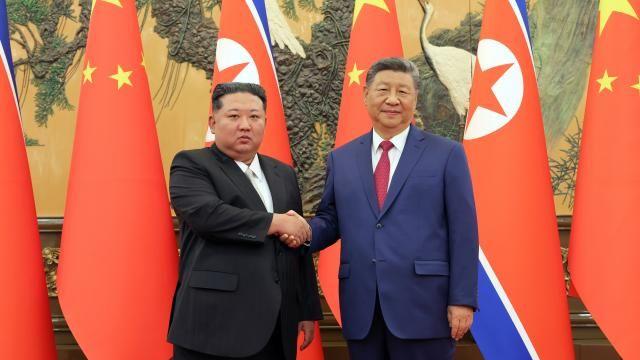 Kim Jong-un and Xi Jinping pledge unshakable ties through summit meeting