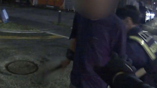 왕복 6차선 도로서 둔기 '휙휙'…