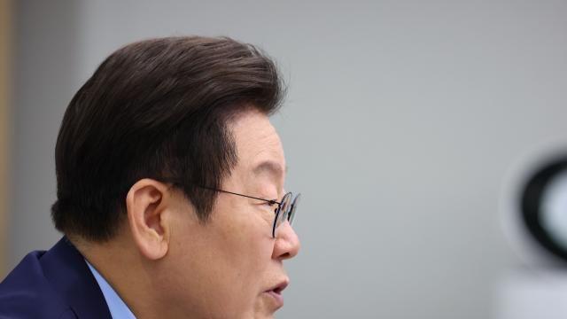 李 